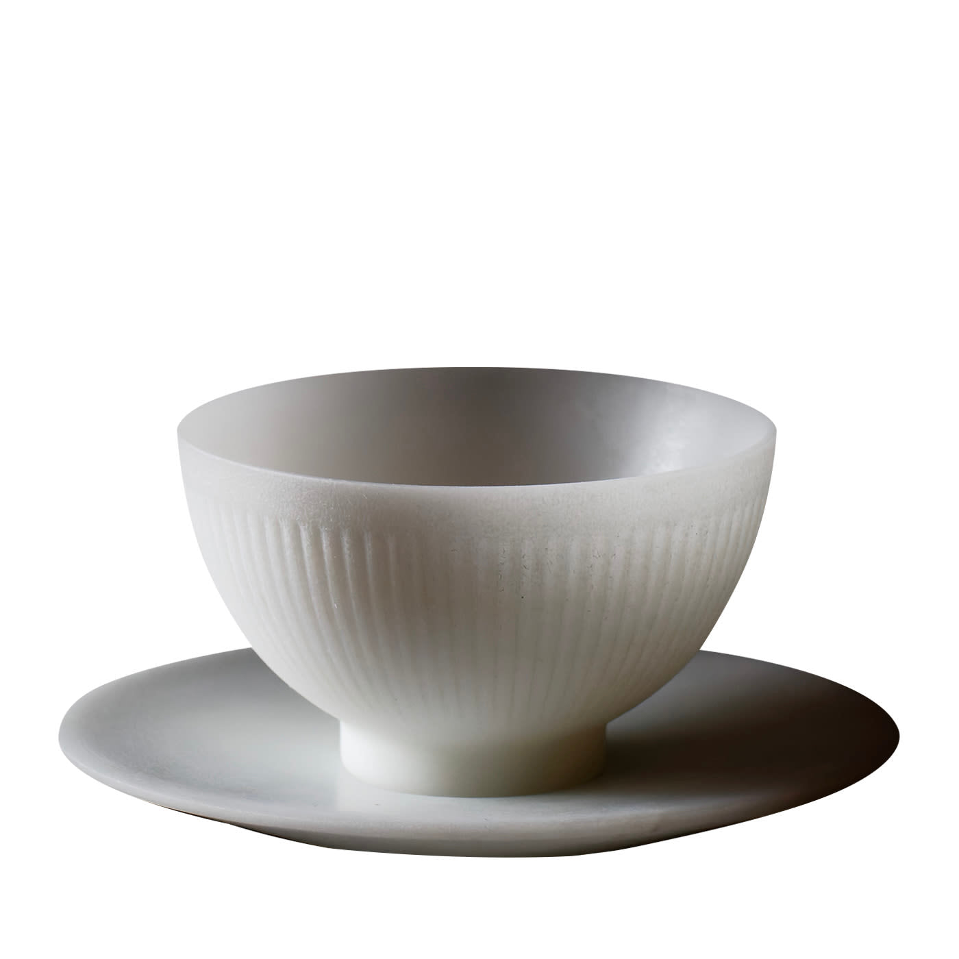 Tazza da tè e piattino statuario